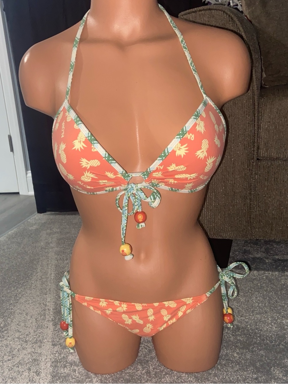 COCO RAVE S bottom, XS/S C-cup top. ALOHA RAVE orange pineapple wood bead bikini